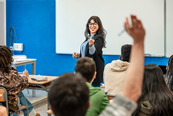 Instructor pointing at a student in the classroom