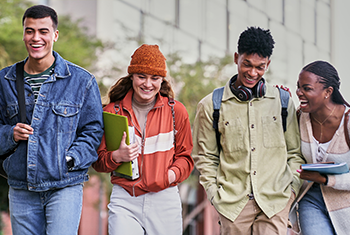 Group of friends walking together on campus