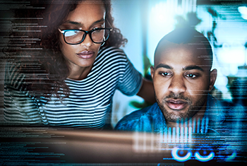 Woman and man coding