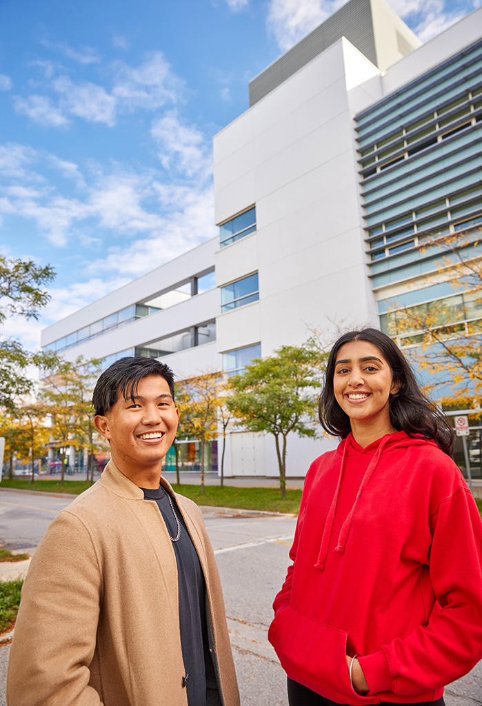 male and female student in front of dahdaleh building on keele campus
